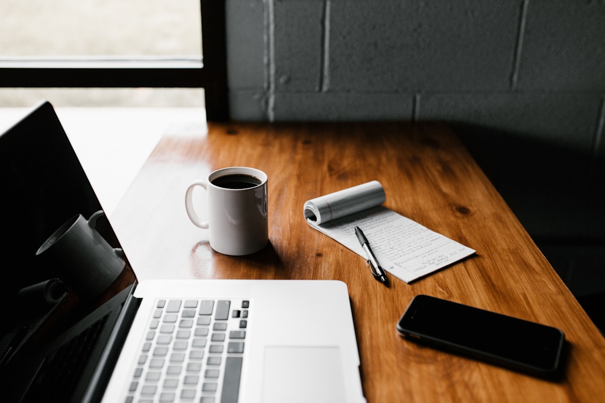 Reading article on laptop